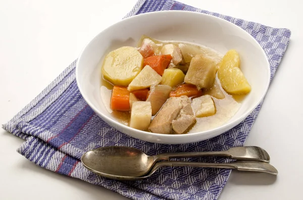 Classic irish stew with a spoon and deep plate — Stock Photo, Image