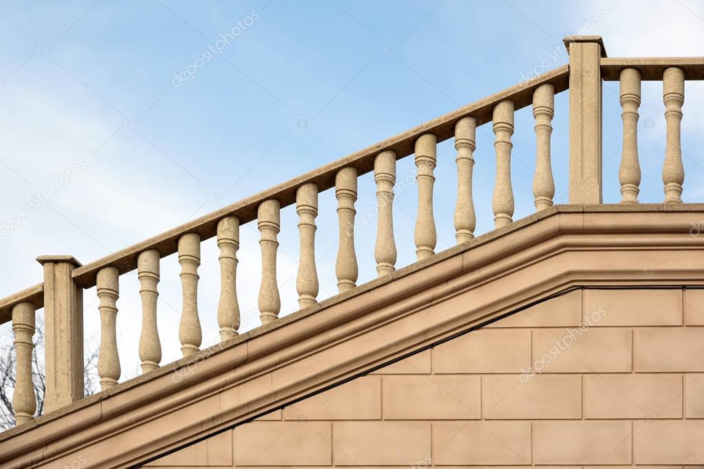 Modern stone railing.