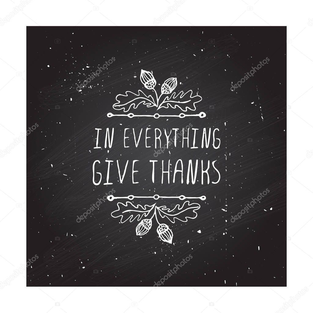 Handdrawn thanksgiving label with acorns and text on chalkboard background. In everything give thanks.