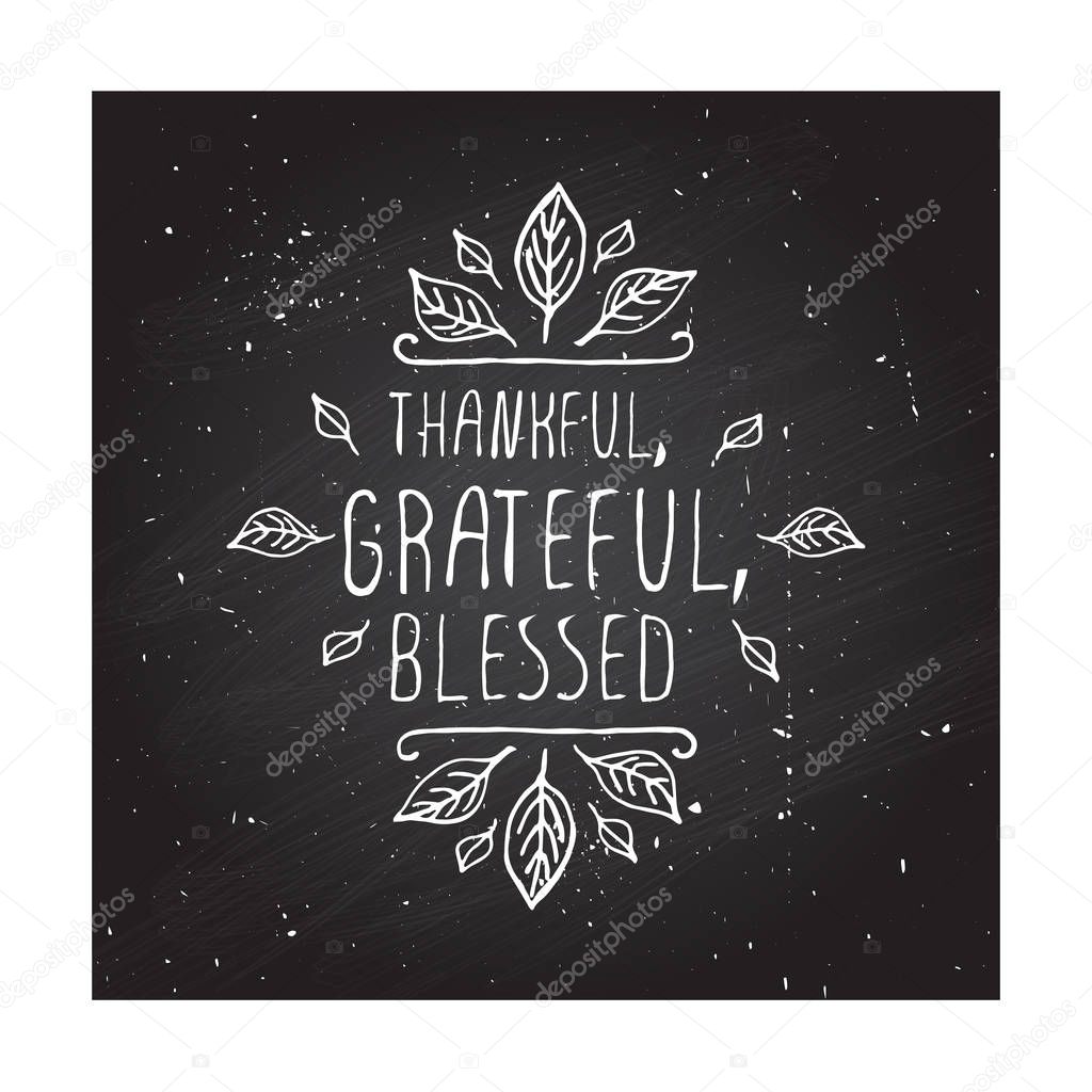 Handdrawn thanksgiving label with leaves and text on chalkboard background. Thankful, grateful, blessed.