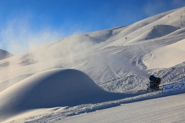 Snow cannon at work at Livigno ski resort, Italy