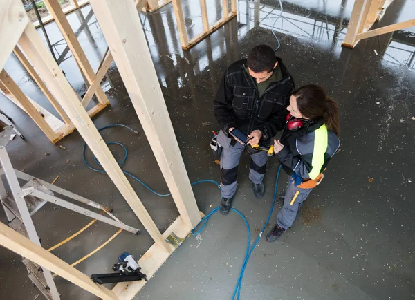 High Angle View Of Workers With Digital Tablet At Site — Stock Photo, Image