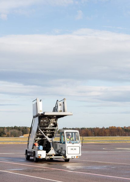 Gangway Moving On Wet Airport Runway