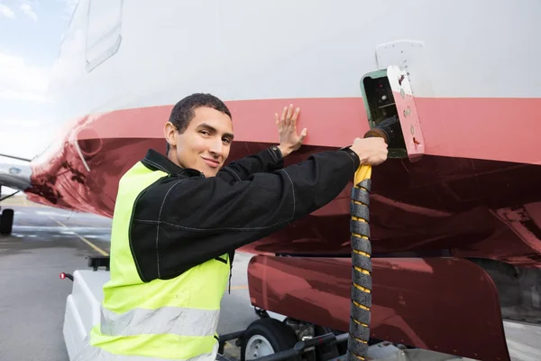 Portrait Of Crew Member Charging Airplane On Runway — Stock Photo, Image