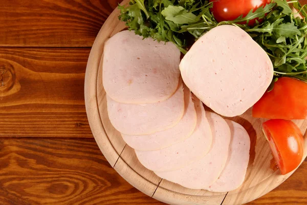 Sliced chicken ham with vegetables. — Stockfoto