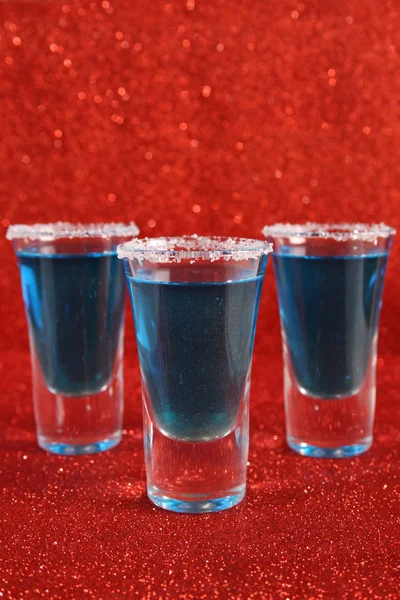 Tre glas med blå drycker — Stockfoto