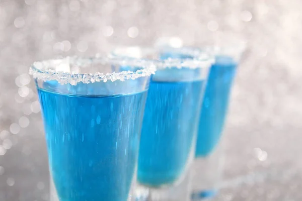 Tre glas med blå drycker — Stockfoto