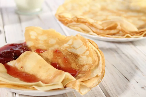 Thin pancakes with strawberry jam — 스톡 사진