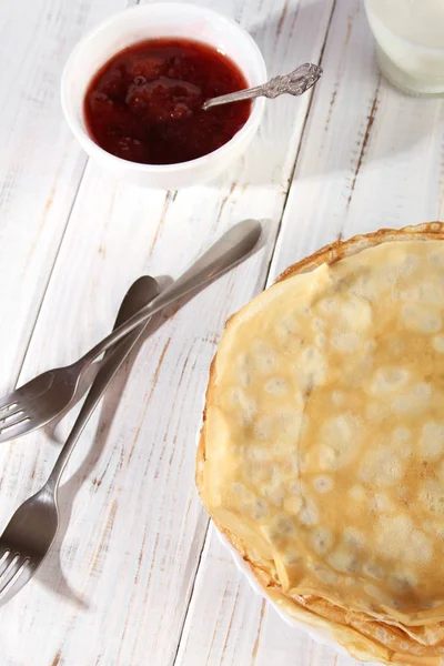 Thin pancakes with strawberry jam — 스톡 사진