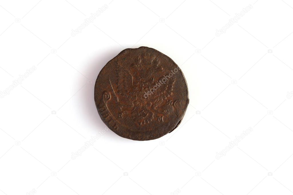 Numismatics. Old coin on a white background