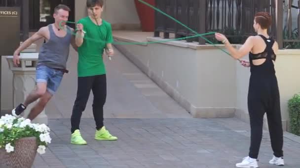 Group of sportsmen jumping with jump rope in Dubai — Stock Video