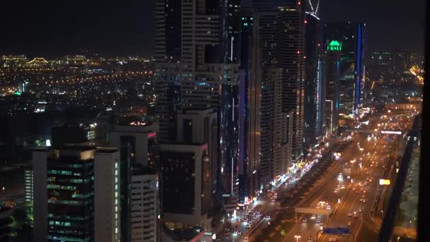 Dubai skyline en la noche, Emiratos Árabes Unidos — Vídeos de Stock