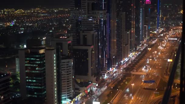 Dubai skyline en la noche, Emiratos Árabes Unidos — Vídeos de Stock