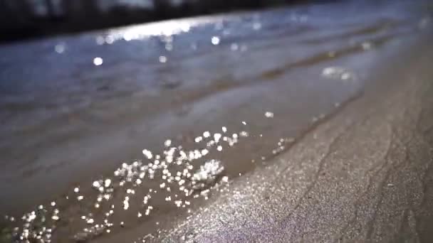 Slow-motion of Crystal clear water and gold sand — Stock Video