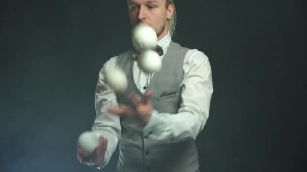 Closeup of man juggling balls. Concept of success, business and managing — Stock Video