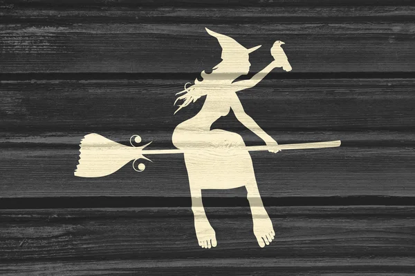 Flying young witch icon. Witch silhouette on a broomstick — Stock Photo, Image