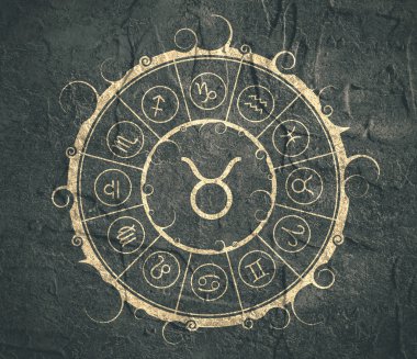 Astroloji sembolleri bir dairede. Boğa işareti