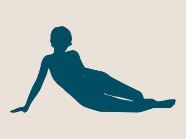 Beyaz bir arka plan üzerinde izole yerde yatan kadın