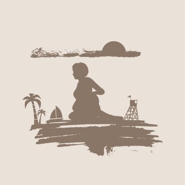 Genç bir kadın kumsalda güneşleniyor..