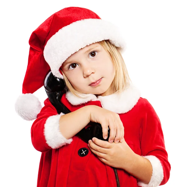 Noel Baba şapkalı çocuk. Beyaz arka plan üzerinde izole Noel çocuk — Stok fotoğraf