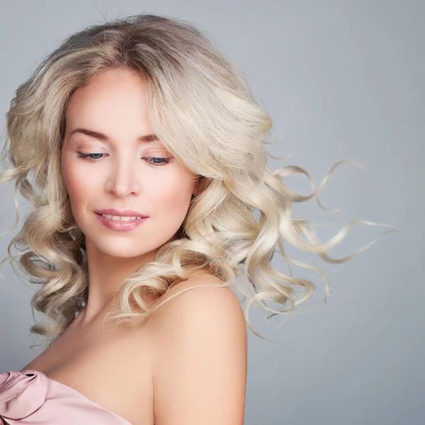 Beautiful Blonde Woman with Blowing Blonde Curly Hair — Stock Photo, Image