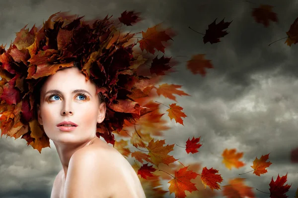 Fantasy Autumn Season Concept. Autumn Model Woman against Clouds — Stock Photo, Image