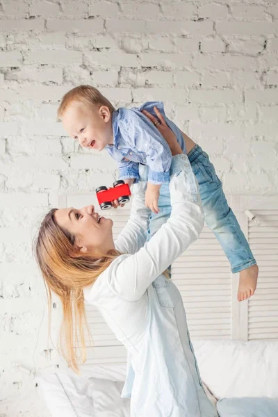 Mother and Son Having Fun at Home. Mother and Child Hugging. — Stock Photo, Image