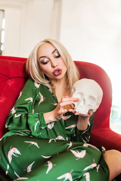Fashion blonde woman with white skull — Stock Photo, Image