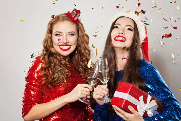 Happy Christmas women with confetti — Stock Photo, Image