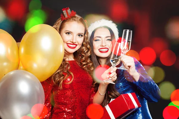 Feliz Navidad a las mujeres en abstracto bokeh glitter sparkle party —  Fotos de Stock