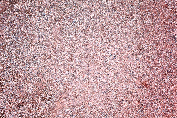 Textura marrón de granito rojo húmedo grava. Arena y piedras — Foto de Stock