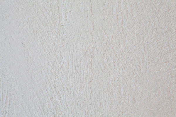 흰색 과 화려하게 얽힌 지저분 한 벽 파편의 질감 배경. — 스톡 사진