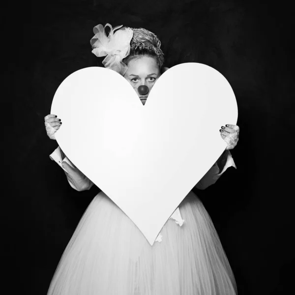 Black and white photo of actress woman clown with heart — Stock Photo, Image