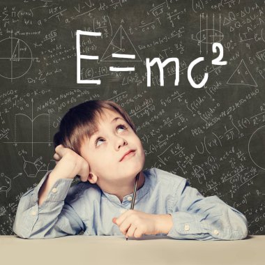 Student little boy and science background. Kid with science formulas