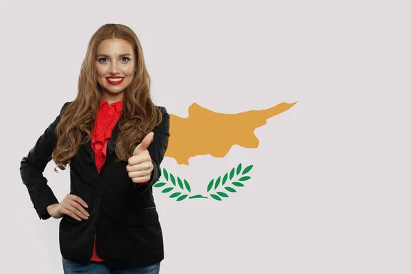 Cheerful young woman showing thumb up with Cyprus flag. — ストック写真