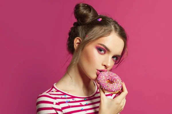 Cheerful Woman Eating Donut Pink Background — Stock Photo, Image