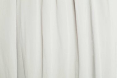 Beyaz ipek pürüzsüz arka plan. Kumaş saten dokusu.