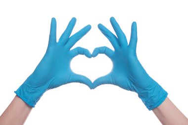 Heart of hand in medical gloves isolated on white background clipart
