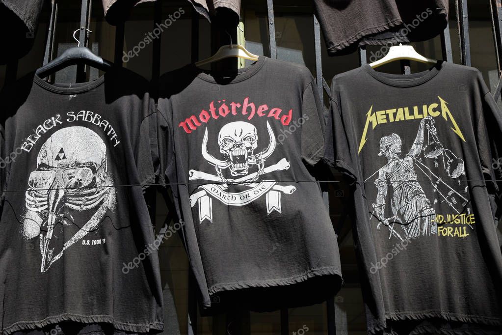 ATHENS, GREECE - APRIL 1, 2018: T-shirts for sale printed with heavy metal and hard rock music band logos.
