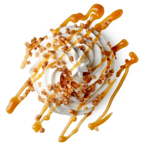Whipped cream with caramel sauce and nuts — Stock Photo, Image