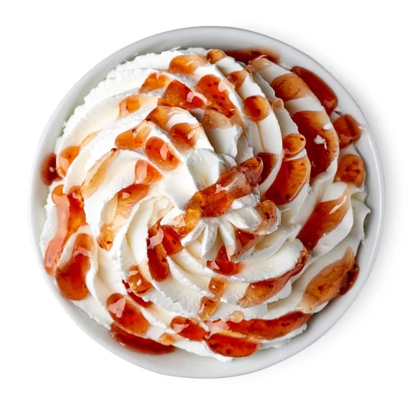 Bowl of whipped cream and strawberry sauce — Stock Photo, Image