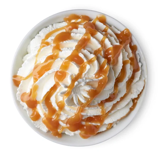 Bowl of whipped cream and caramel sauce — Stock Photo, Image
