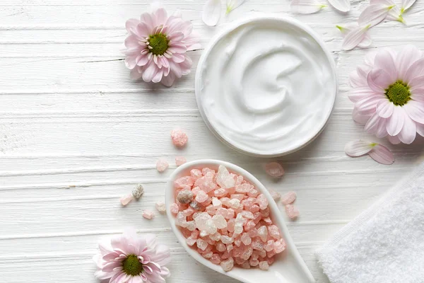 White cosmetic cream and bath salt — Stock Photo, Image