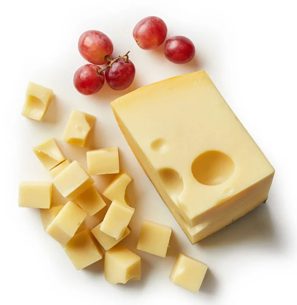 Bit och kuber av schweizisk ost — Stockfoto