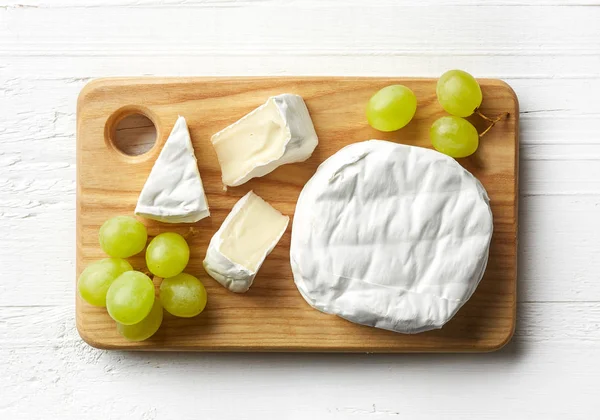 Piece of camembert cheese — Stock Photo, Image