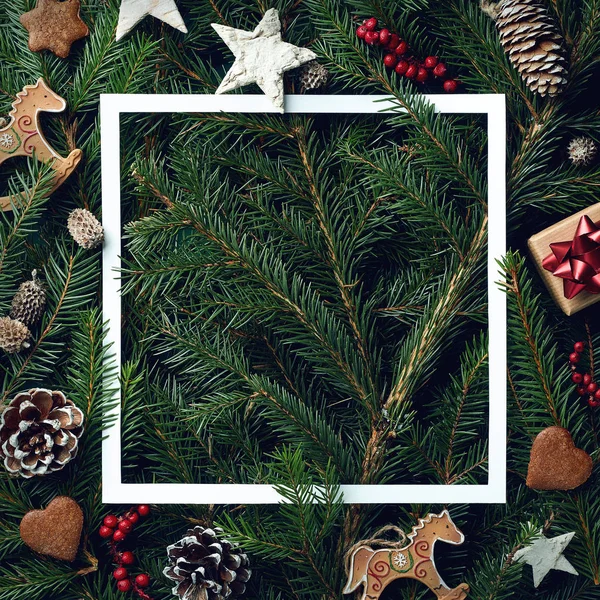 Frame of Christmas tree branches and decorations — Stock Photo, Image