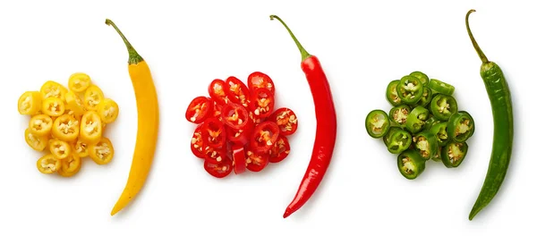 Whole and chopped colorful chili peppers — Stock Photo, Image