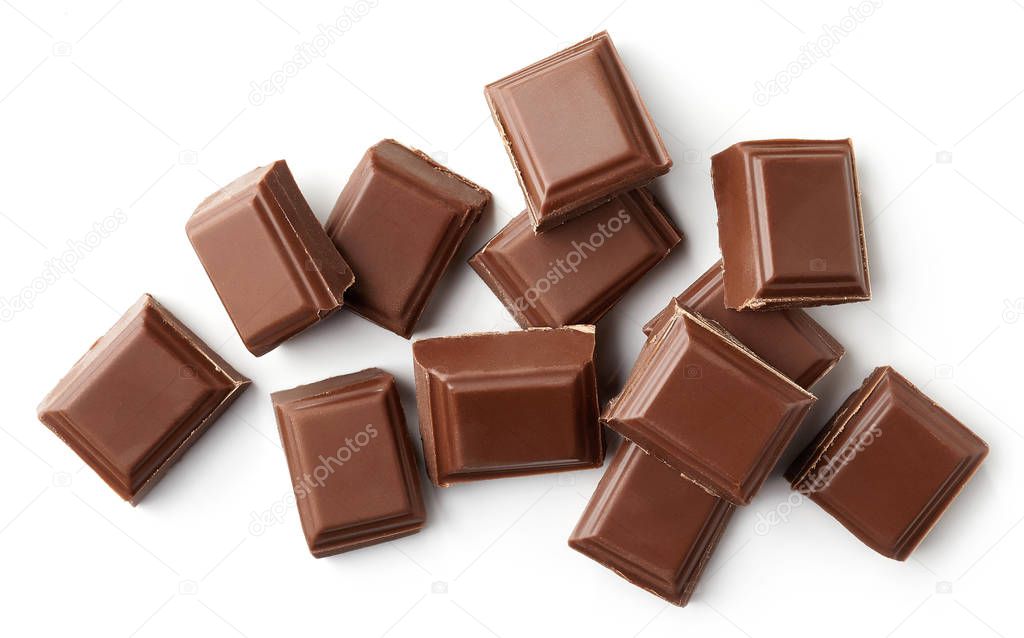 Milk chocolate pieces isolated