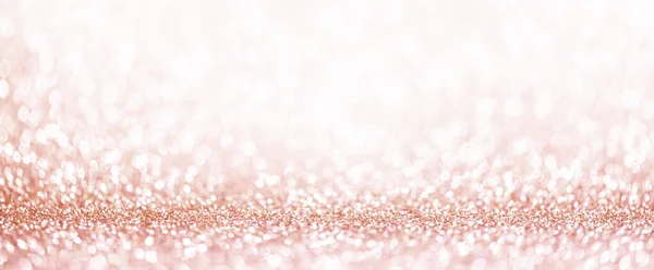 Light pink bokeh background. Pastel blur glitter abstract wallpaper. Girly and classy design element for wedding celebration.