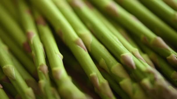 Closeup Fresh Green Asparagus Rustic Wooden Board — Stock Video